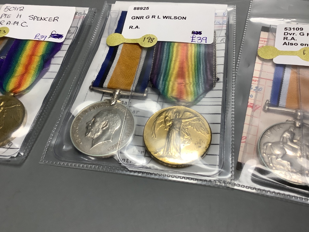 A collection of WW1 medal pairs
